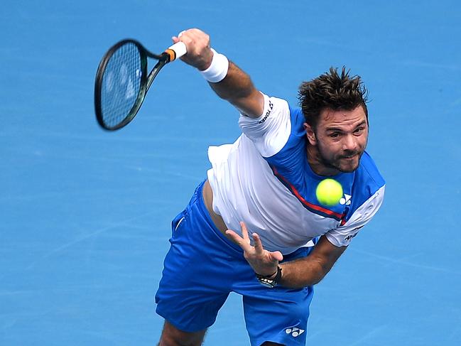 Stan Wawrinka of Switzerland serves during his fourth round match against Daniil Medvedev of Russia on day eight of the Australian Open tennis tournament at Margaret Court Arena in Melbourne, Monday, January 27, 2020. (AAP Image/Lukas Coch) NO ARCHIVING, EDITORIAL USE ONLY