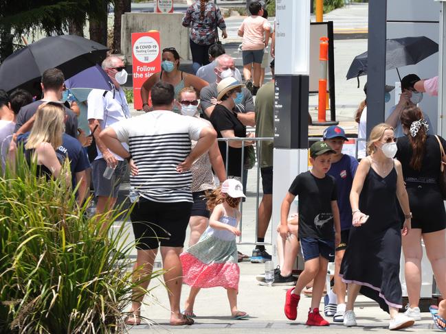 Huge queues snake around the block form the Gold Coast University Hospital CoVid testing clinic. Picture Glenn Hampson