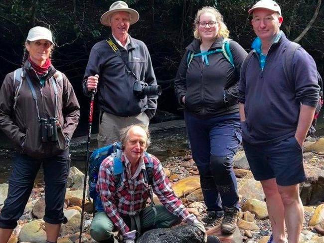 Sutherland Shire Environment Centre members Ricki Coughlan, Bob Crombie, Ian Hill, researcher Catherine Morrison and Dr Ian Wright. Ian Hill is holding one of the larger lumps of coal found on the weekend. Picture: Supplied