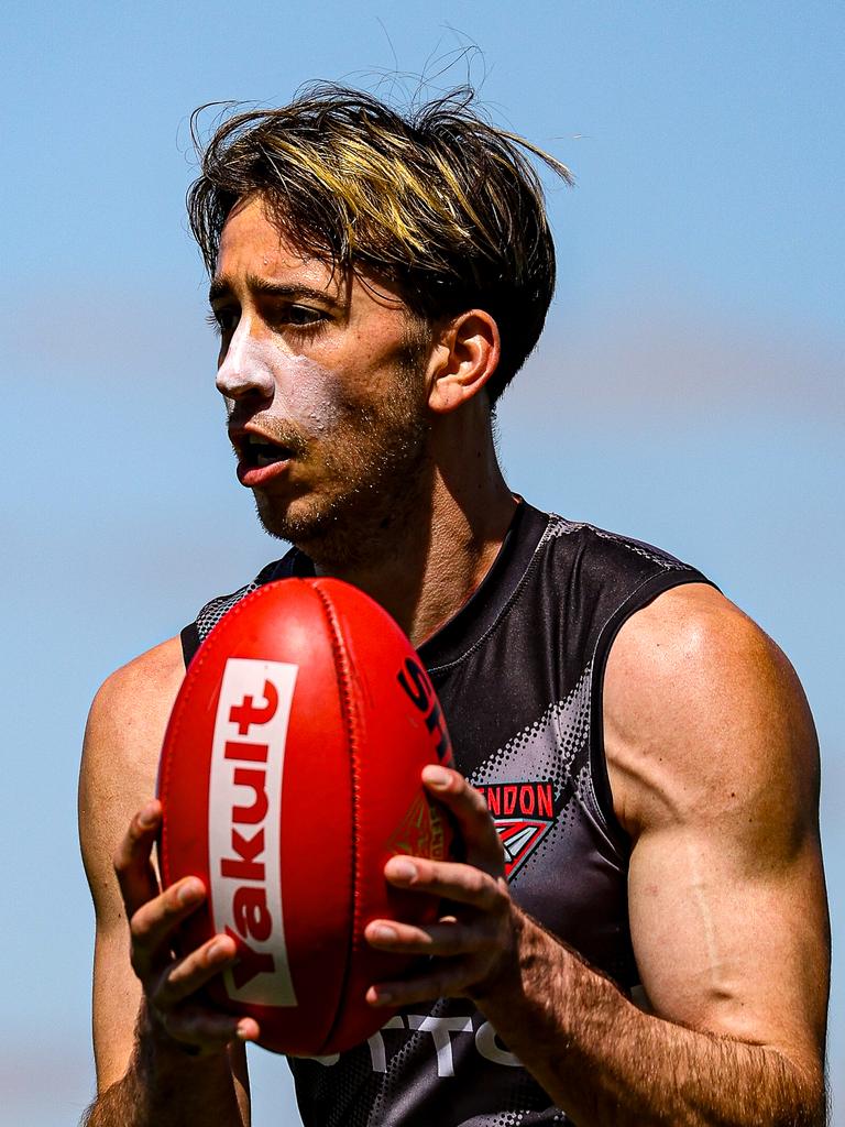 Nic Martin moves with the ball at Essendon training. Picture: Essendon FC