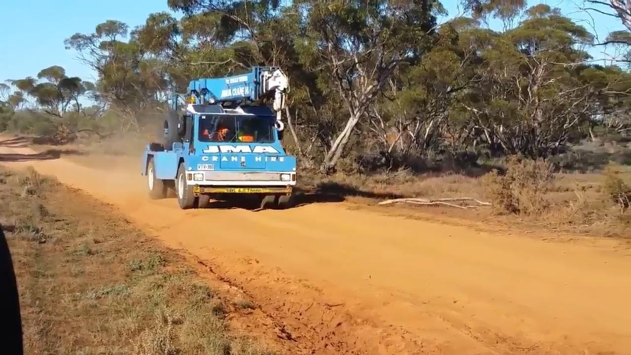 Crane and truck at the scene of fatal Rossair plane crash at Renmark