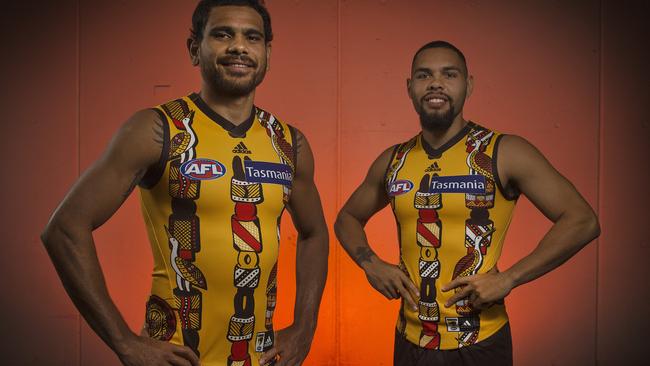 Cyril Rioli and Jarman Impey model Hawthorn’s Indigenous Round jumper. Picture: Michael Klein