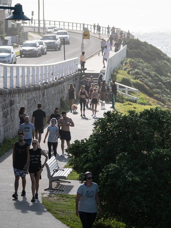 People dotted along the coastal walk near Bronte Beach on Saturday. Picture: AAP