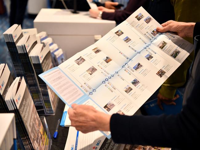 An attendee at the Metro session takes a look at some of the plans.