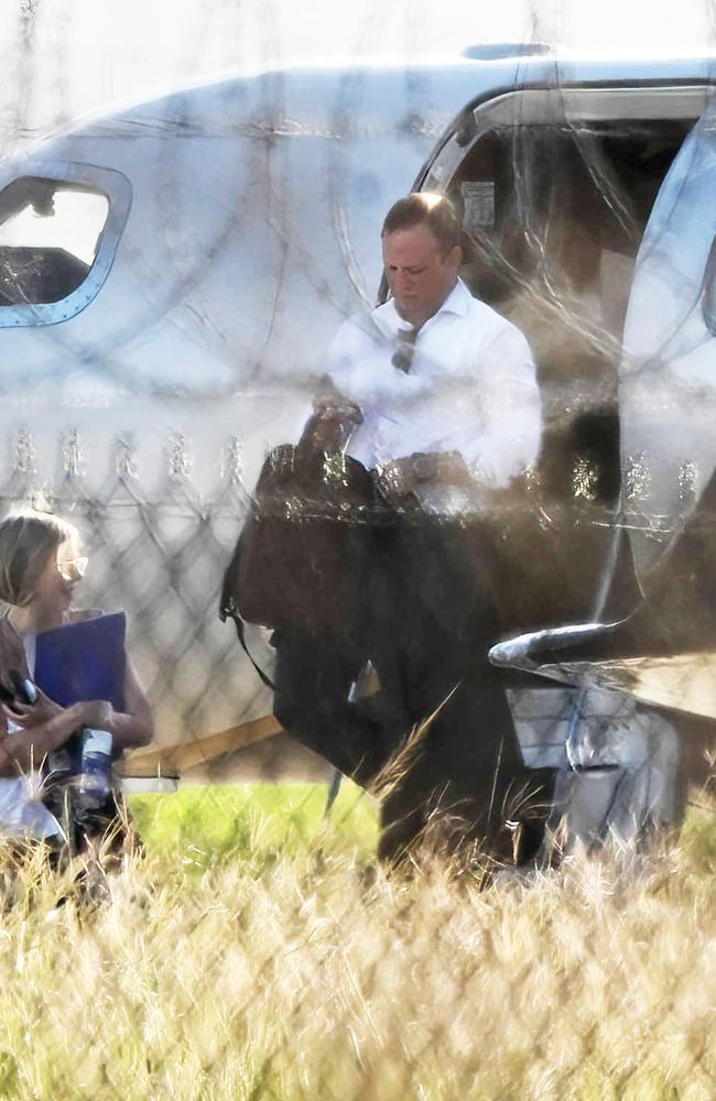 Premier Steven Miles and staff exit a private jet at Brisbane Airport. Picture: Lyndon Mechielsen/Courier Mail