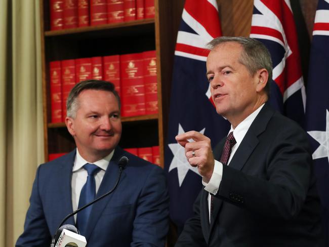 Labor leader Bill Shorten (R) and Shadow Treasurer Chris Bowen (L) hold a press conference in Melbourne, Friday, October 12, 2018. Labor are revealing today the ALP will back the Government's plan to fast-track tax cuts to small businesses. (AAP Image/David Crosling) NO ARCHIVING