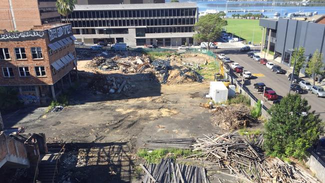 Demolition of the old Frogys site for the construction of the $234 million Waterside development has ground to a halt with the contractor owed hundreds of thousands of dollars. Picture: Richard Noone