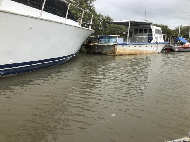 A vessel in Fig Tree Creek subject to court orders due to derelict condition. The vessel is on the western bank, and is unseaworthy, has visible cracks in the floor, bollards securing vessel badly rusted, batteries in engine room have been inundated with water and inoperable, etc. The owner, Kristoffer Raymond Mitchell, lives in New South Wales.