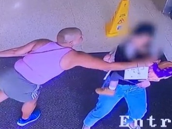 Sick attack on baby at busy shopping centre