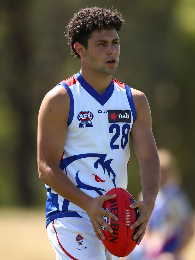 Lachlan Johnson kicks for goal in the NAB League for Oakleigh.