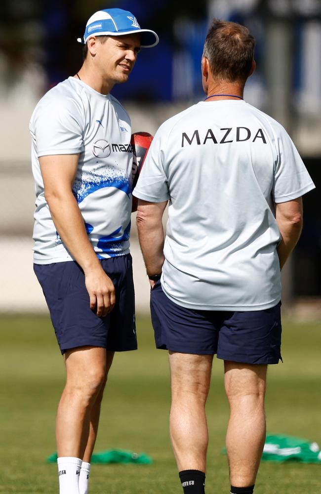 Jed Adcock has a chat with Alastair Clarkson. Picture: Michael Willson/AFL Photos