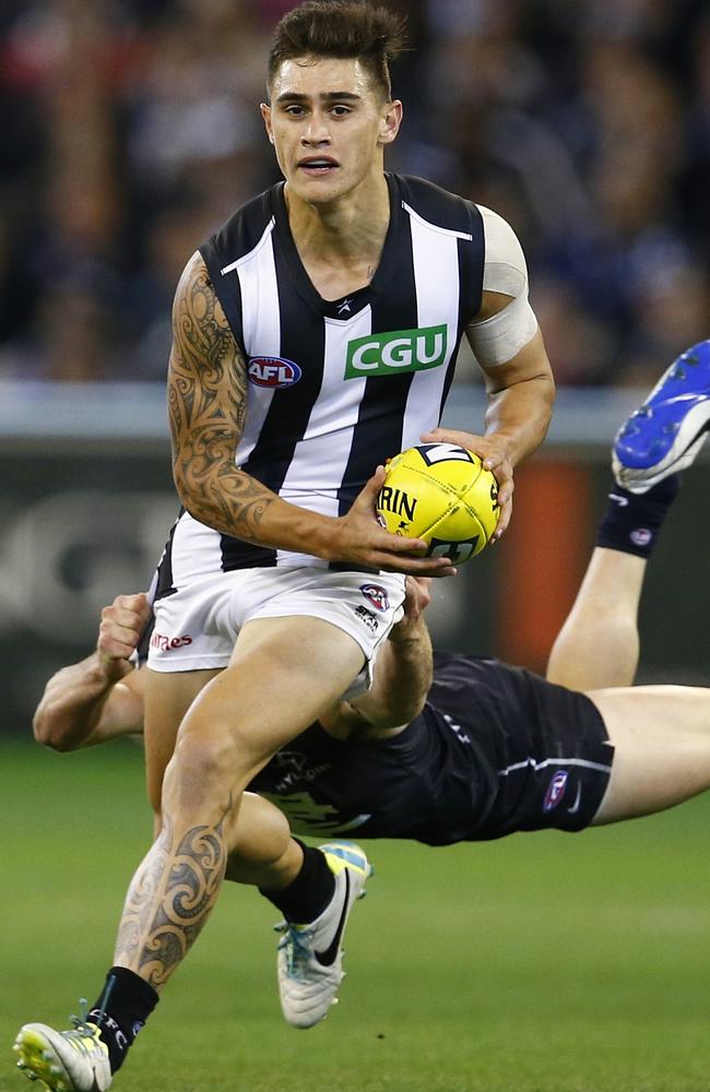 Magpie Marley Williams provides run out of defence. Picture: Michael Klein