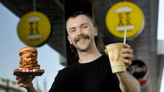 Stax Burger Co founder Zaynn Bird with some impressive Stax creations. Picture: Naomi Jellicoe