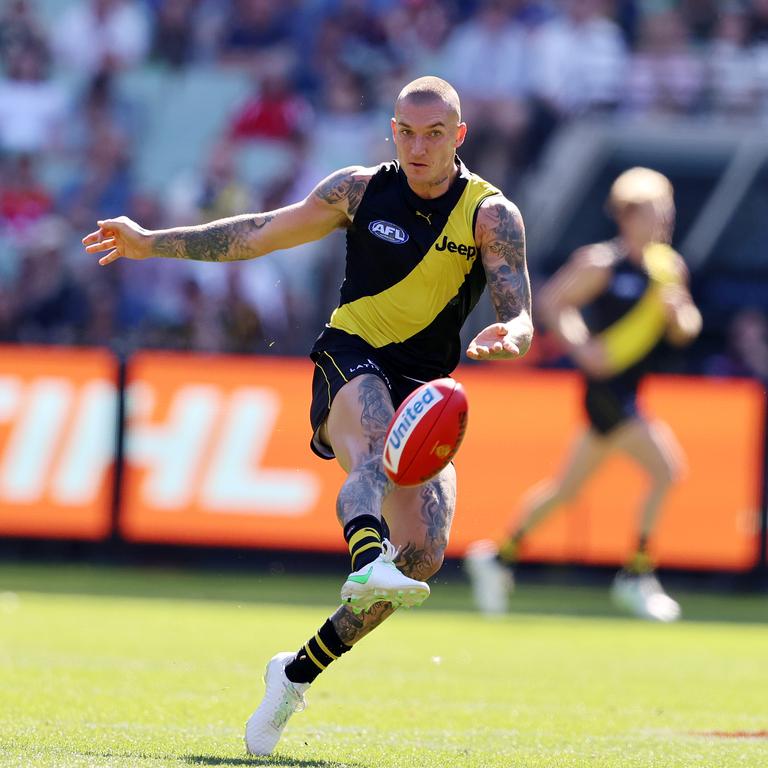 Dustin Martin gets a kick away. Picture: Michael Klein