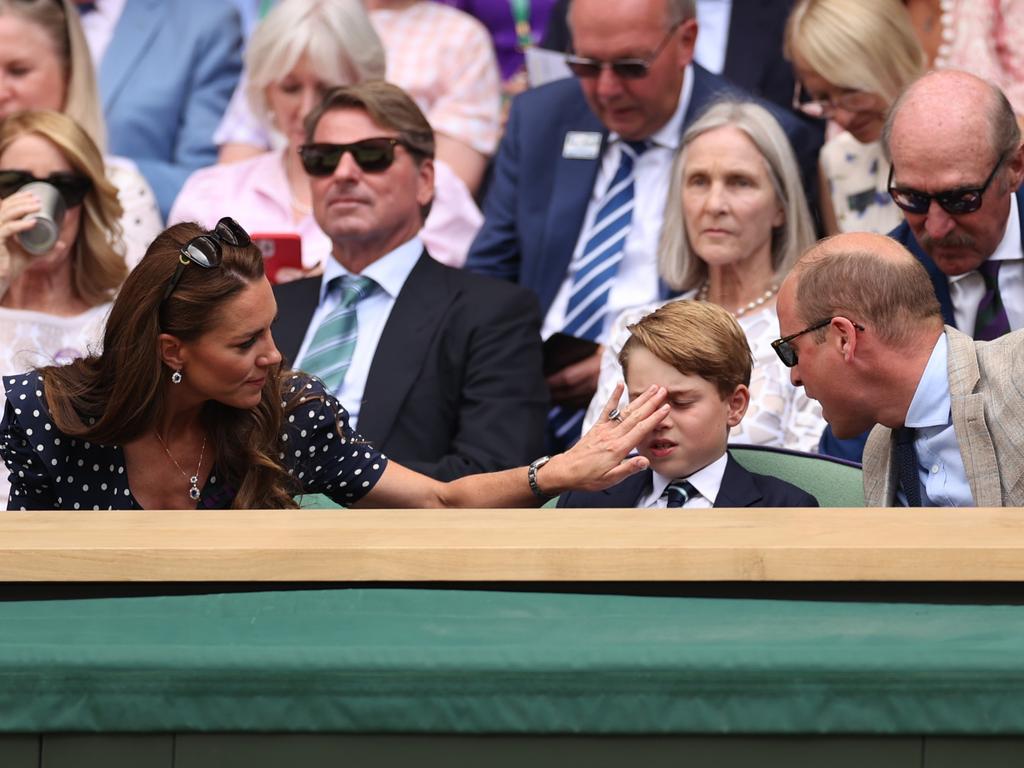 Kate checks on Prince George during the match. Picture: Getty Images