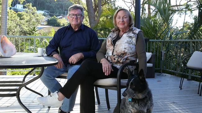 Journalist and TV crime reporter Steve Barrett with wife Anne-Marie and dog Boris at their home in Nelson Bay, NSW. Picture: Britta Campion