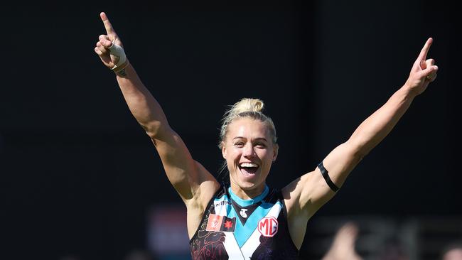 Erin Phillips celebrates a goal for Port Adelaide. She also played and won premierships with the Adelaide Crows. Photo by Sarah Reed/AFL Photos via Getty Images