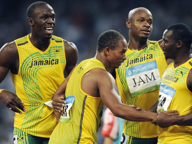 Jamaica's gold medal winning relay team, from left, Usain Bolt, Michael Frater, Asafa Powell and Nesta Carter celebrate after the men's 4x100-metre relay final during the athletics competitions in the National Stadium at the Beijing 2008 Olympics in Beijing. Picture:  AP