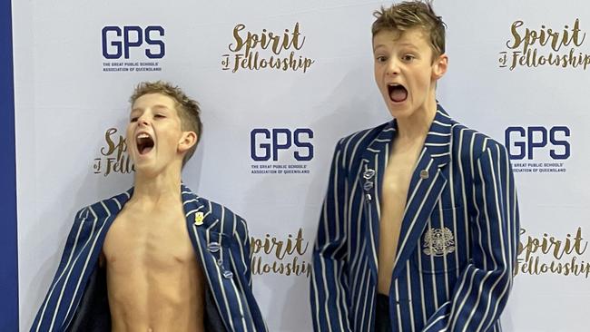 THe Nudgee junior swim captains cheer with delight after learning of their win.