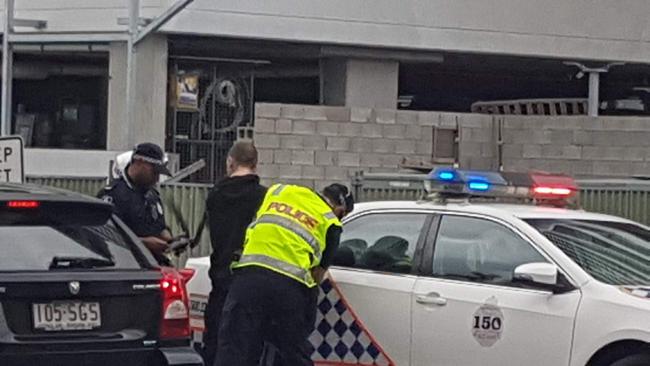 Man arrested and emergency crews shut down busy Gold Coast street after ...