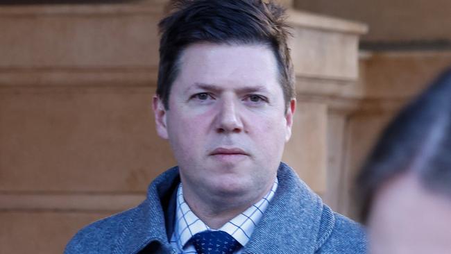 Barrister Enzo Belperio leaves the Sir Samuel Way courts building in Adelaide. Picture: Russell Millard Photography