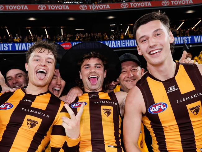 MELBOURNE, AUSTRALIA - SEPTEMBER 06: Jack Ginnivan, Nick Watson and Connor Macdonald of the Hawks pose for a photo during the 2024 AFL Second Elimination Final match between the Western Bulldogs and the Hawthorn Hawks at The Melbourne Cricket Ground on September 06, 2024 in Melbourne, Australia. (Photo by Dylan Burns/AFL Photos via Getty Images)