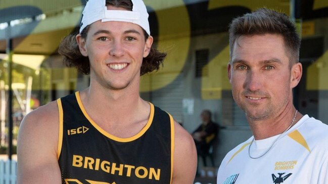 Brighton signing Hayden Kernahan alongside coach Brett Backwell. Picture: Brighton Football Club