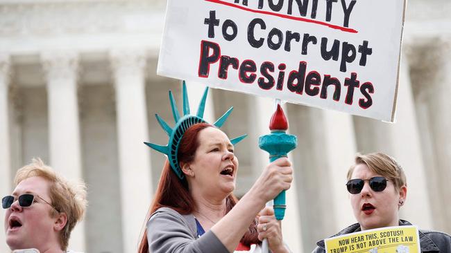 Demonstrators participate in a protest outside the US Supreme Court.