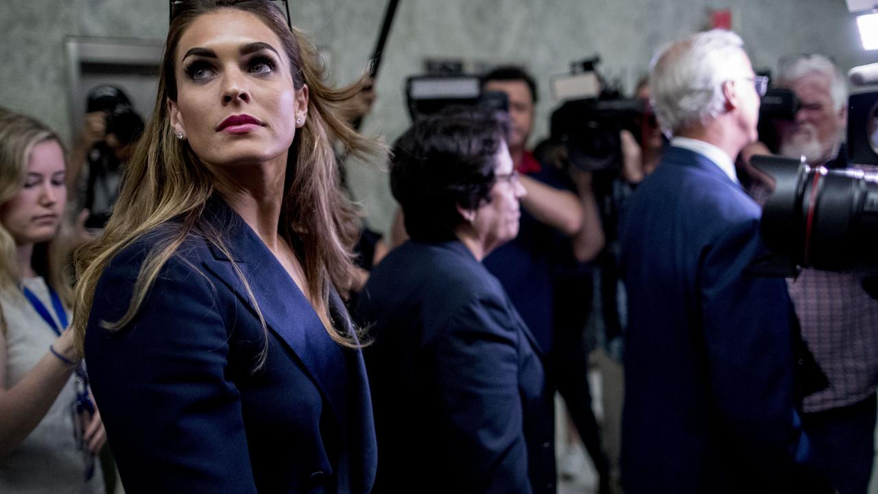 The press pack surrounding Hope Hicks. Picture: AP