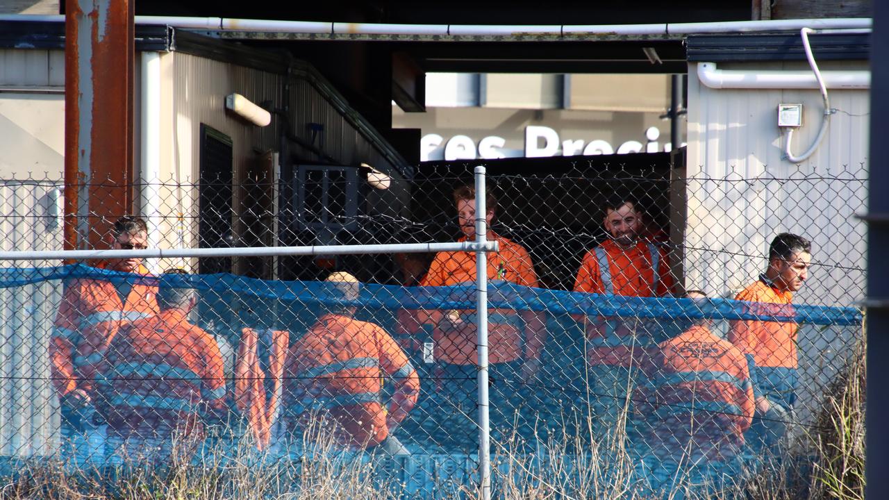 Workers at the site after the incident Tuesday afternoon. Picture: David Clark