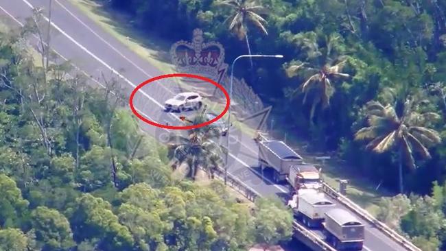 Dramatic footage has been released of the moment an 18-year-old was arrested after quick-thinking truckies helped authorities stop an allegedly stolen vehicle in Cairns. Picture: QPS.