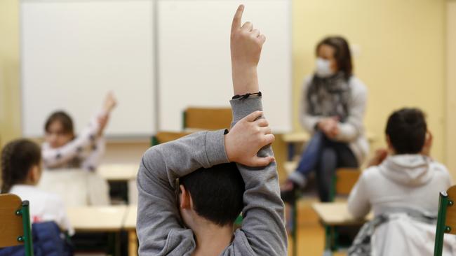 As face-to-face classroom teaching restarts, we should continue to foster learning at home. Picture: AP Photo/Jean-Francois Badias