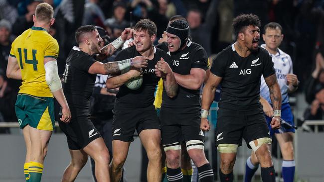 George Bridge of New Zealand is congratulated on scoring a try during the Bledisloe Cup match between the New Zealand All Blacks and the Australian Wallabies at Eden Park in Auckland, New Zealand, Saturday, August 17, 2019. (AAP Image/David Rowland) NO ARCHIVING, EDITORIAL USE ONLY