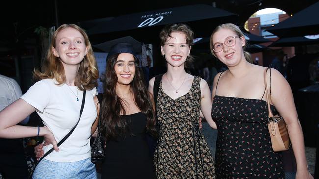 Catriona Sanderson, Isabella Pfundt, Alyssa Moller and Samantha Yelcin celebrate graduation. Picture: Alan Barber