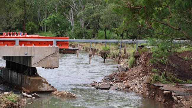 The Bruce Highway crossing at Ollera Creek which has been destroyed by flood water. Picture: Adam Head