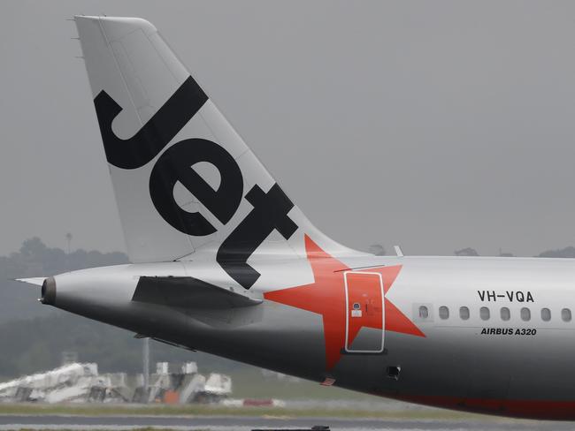 SYDNEY, AUSTRALIA - NewsWire Photos February 25, 2021: QANTAS has reported losses of around 1 billion dollars over the last year, counting the financial cost of Covid-19 on the airline. Jetstar planes are pictured at Sydney airport today. Picture: NCA NewsWire / David Swift