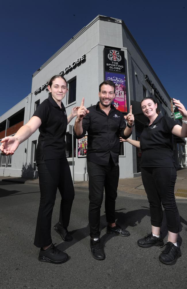 Sporting Globe's Jordanna May, manager Jordan Lamaison and Jessica Alexander are ready to welcome customers to the Sporting Globe on Australia Day. Picture: Alan Barber