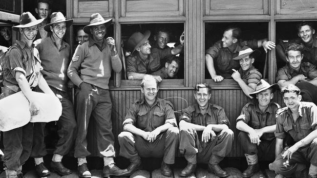 A young Reg Saunders surrounded by his mates in the AIF. Picture: Australian War Memorial.