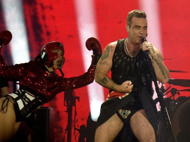 Robbie Williams brings his cheeky show to Australia next February. Picture: AFP