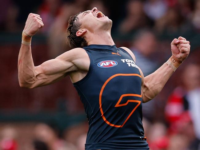 SYDNEY, AUSTRALIA - SEPTEMBER 07: Aaron Cadman of the Giants celebrates a goal during the 2024 AFL First Qualifying Final match between the Sydney Swans and the GWS GIANTS at The Sydney Cricket Ground on September 07, 2024 in Sydney, Australia. (Photo by Dylan Burns/AFL Photos via Getty Images)