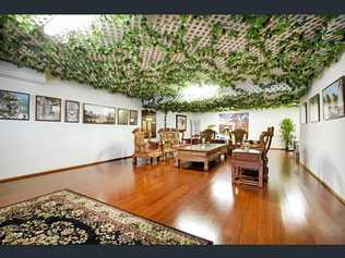 The Cannonvale house owned by Chinese billionaire Raymond (Peter) Wang has been listed for sale.