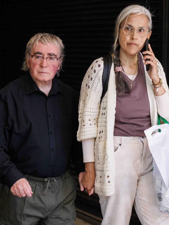 The cult leader left Downing Centre Court flanked by his wife. Picture: NCA NewsWire / David Swift