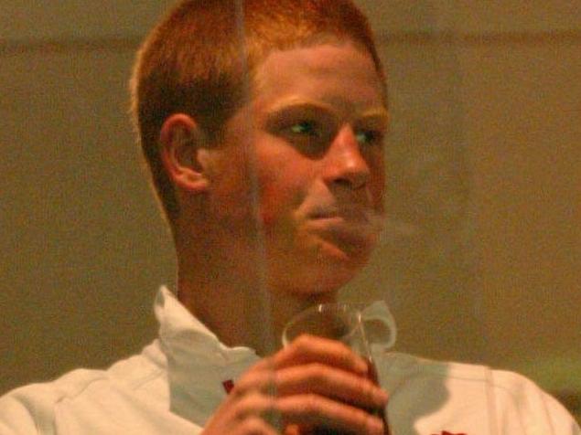 09/11/2003 Prince Harry in Corporate box drinking a beer and watching the England v Wales Rugby World Cup at Suncorp Stadium.