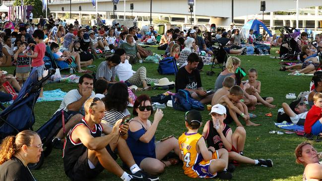 Crowds building at South Bank at 4:45pm hours ahead of the fireworks display, New Year's Eve socials South Bank, South Brisbane.