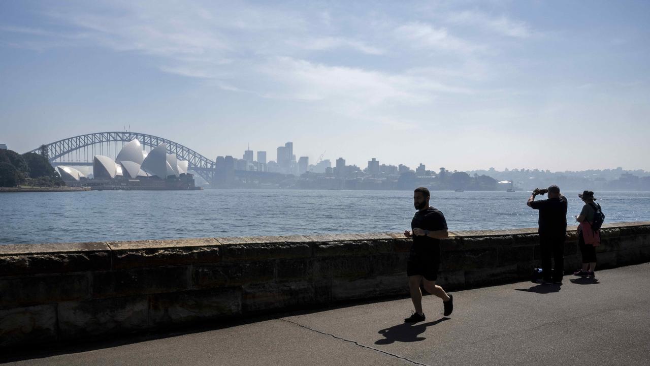 A thick haze settled over Sydney on Thursday. Picture: NCA Newswire/Monique Harmer.