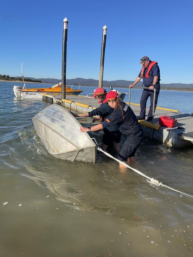 Two people rescued off Hawley Beach after boat capsized. Picture: Tasmania Police Media