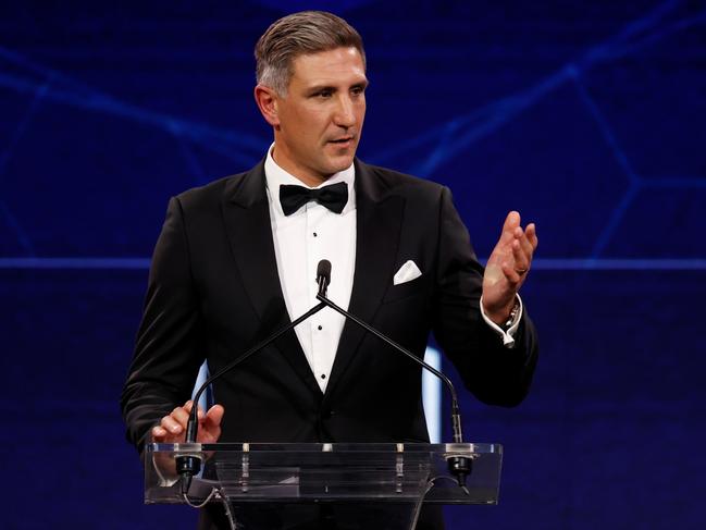 Pavlish addresses the star-studded crowd at the Crown Palladium. Picture: AFL Photos/Getty Images