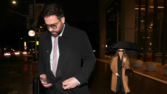 Vincenzo Tesoriero on his way out of the Westpac - Forum Finance case with his partner Sam Ashleigh. Picture: Chris Pavlich for The Australian