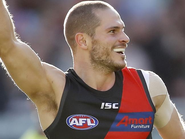 MELBOURNE, AUSTRALIA - JULY 06: David Zaharakis of the Bombers celebrates a goal during the 2019 AFL round 16 match between the Essendon Bombers and the Sydney Swans at the Melbourne Cricket Ground on July 06, 2019 in Melbourne, Australia. (Photo by Dylan Burns/AFL Photos via Getty Images)