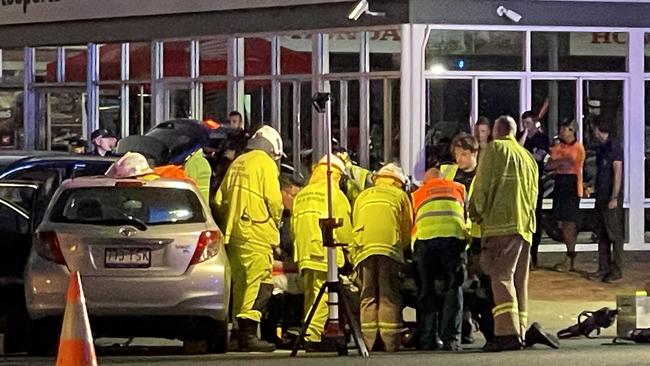 Emergency services work to free motorist after a two-vehicle crash in Rosslea on Friday evening. Photo: Leighton Smith.